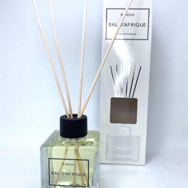 Reed diffuser with Byredo Bal D`Afrique fragrance in a glass bottle, ideal for home scenting.