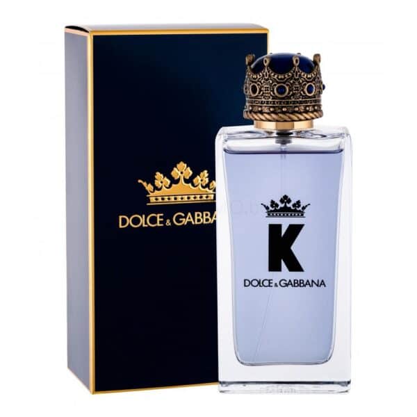 Elegant Dolce & Gabbana K perfume bottle with crown cap, luxurious packaging.