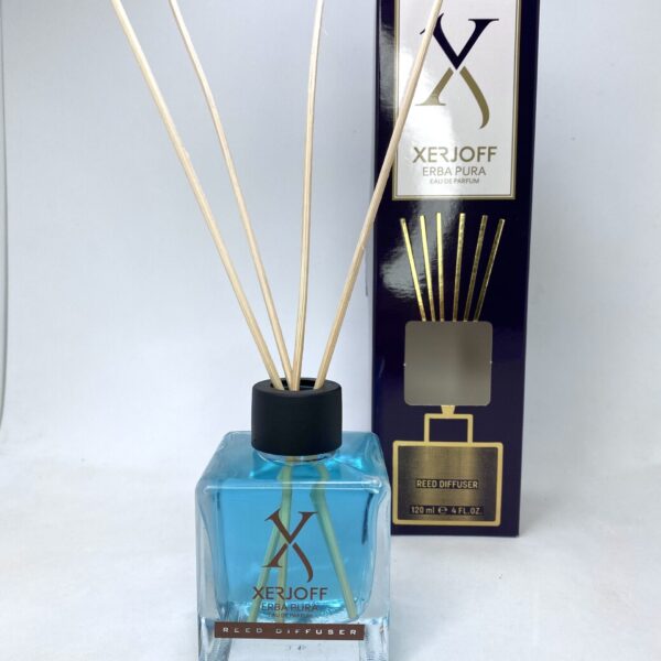 Reed diffuser with Xerjoff Erba Pura fragrance in a stylish blue glass bottle.