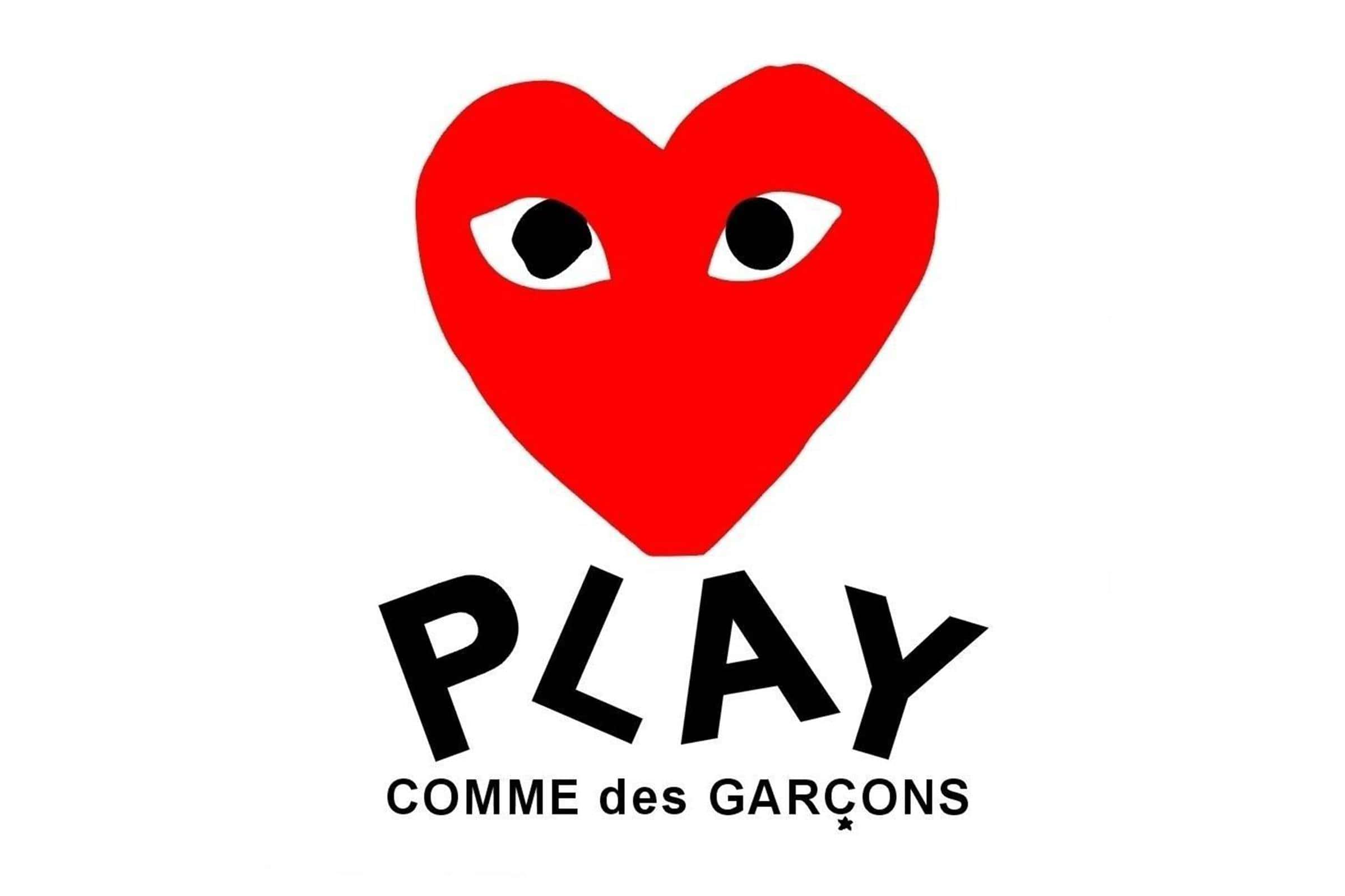 Heart-shaped logo with eyes, representing the iconic COMME des GARÇONS PLAY brand.